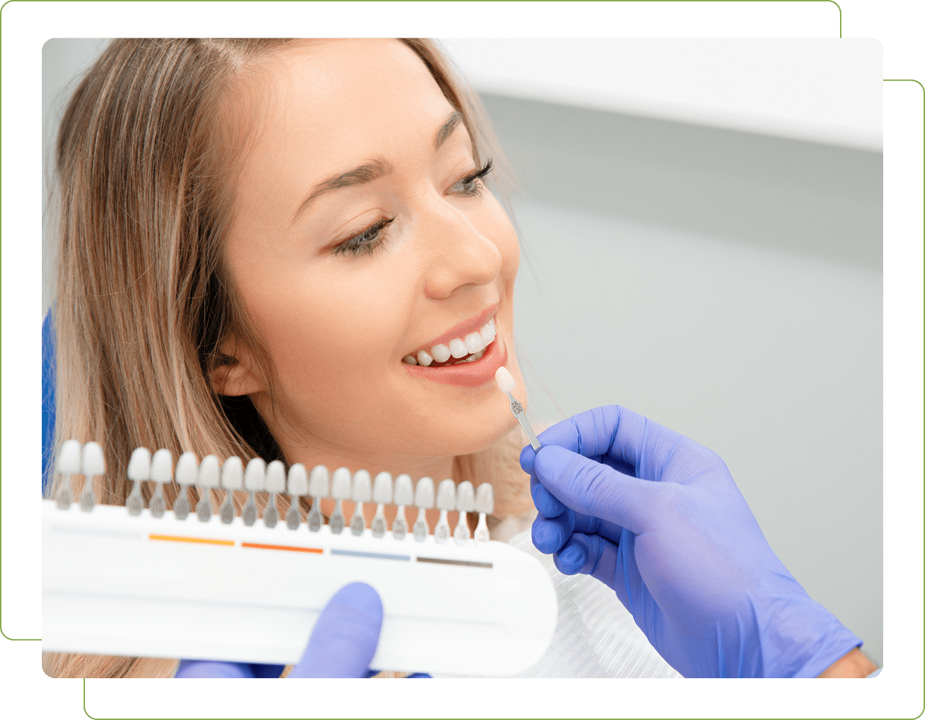 Woman at dentist for teeth color matching.
